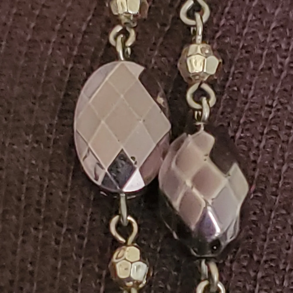 Silvertone and black bead and geometric stations necklace